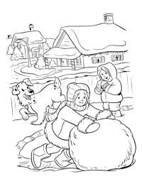 Menino rolando uma bola de neve